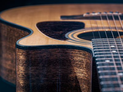 artistic photo of an acoustic guitar